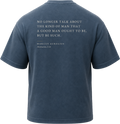 Pigment Midnight Navy
Back view of a faded, dark navy heavyweight cotton t-shirt cut in an intentionally oversized, boxy shape. The garment features architecturally balanced typography printed in Warm Parchment ink. The printed text reads: "NO LONGER TALK ABOUT THE KIND OF MAN THAT A GOOD MAN OUGHT TO BE, BUT BE SUCH." with the attribution "MARCUS AURELIUS" and "Meditations, X.16" directly underneath in a classic serif font.