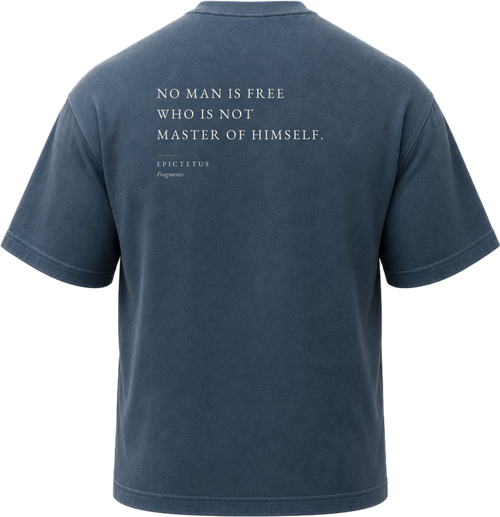 Pigment Midnight Navy
Back view of a faded, dark navy heavyweight cotton t-shirt cut in an intentionally oversized, boxy shape. The garment features architecturally balanced typography printed in Warm Parchment ink. The printed text reads: "NO MAN IS FREE WHO IS NOT MASTER OF HIMSELF." with the attribution "EPICTETUS" and "Fragments" directly underneath in a classic serif font.